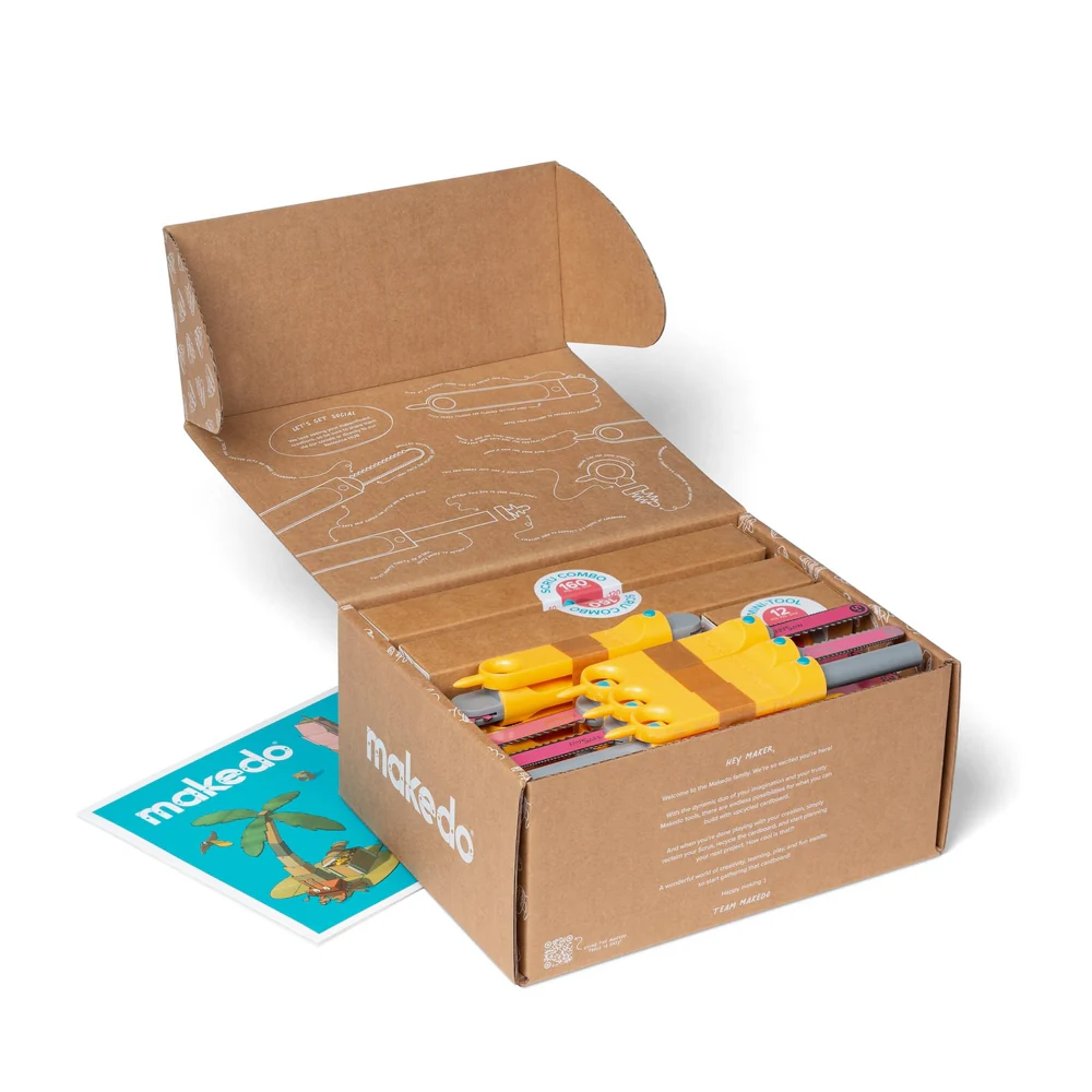 Makedo Invent Kit box open with tool packs and the classroom inspiration poster
