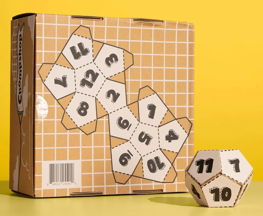 ChompSaw box with a twelve-sided cardboard dice built from the Challenge project