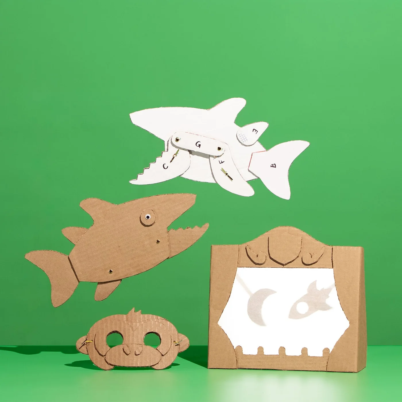 Cardboard shark and creature builds cut with the ChompSaw