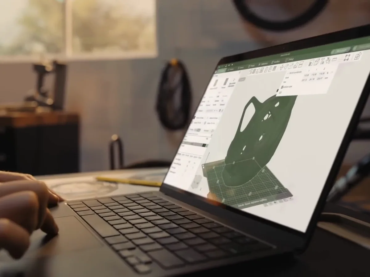 A model being prepared for printing on a laptop