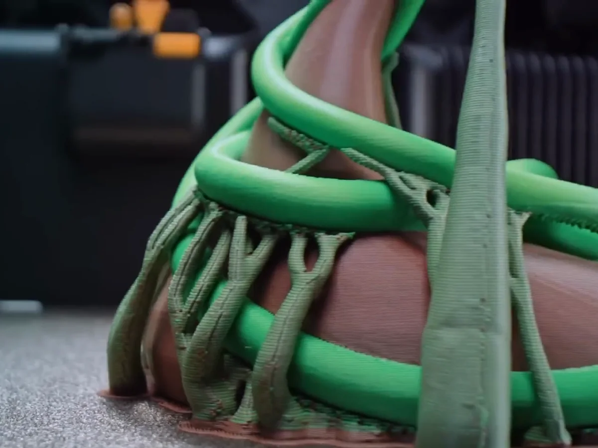 Close-up of a 3D print with tree supports