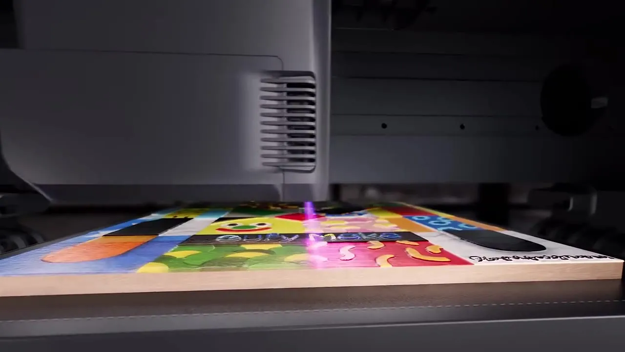 The eufyMake E1 printing a colour design onto a board